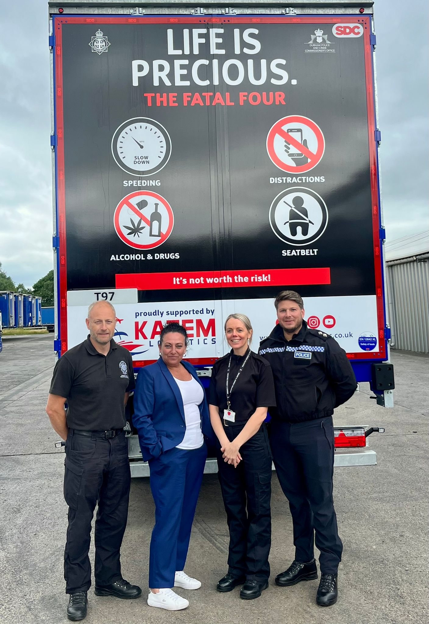 Casulaty Reduction coordinator Peter Tate, Mari Johnson, DC Nat Horner and Inspector Michael Hogg in front of the HGV wrapped in the Life is Precious banner