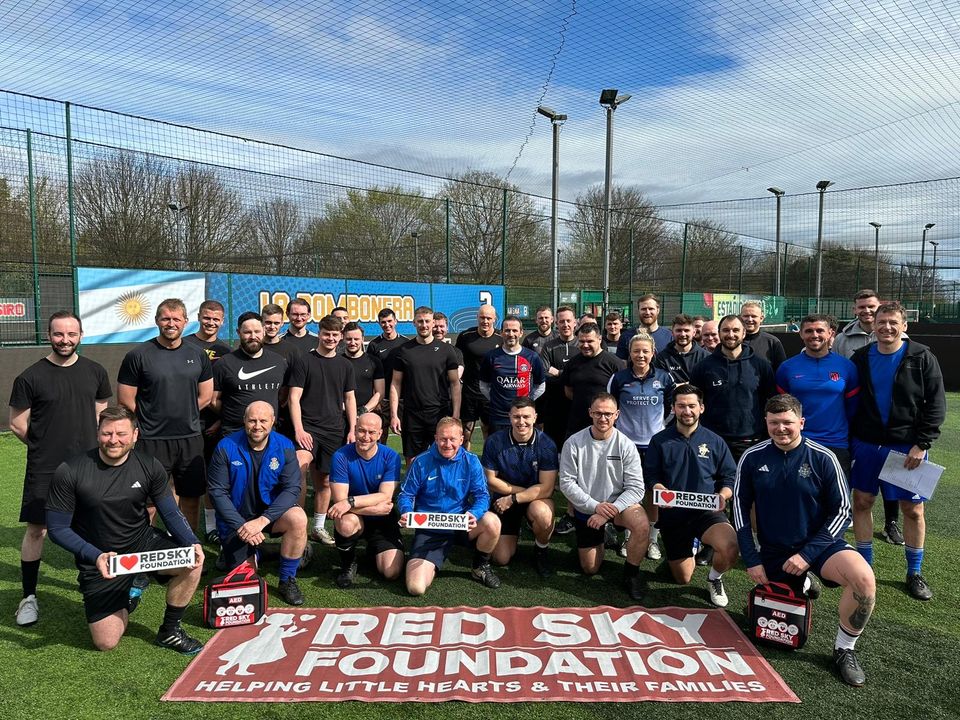 Officers and staff at the charity football match