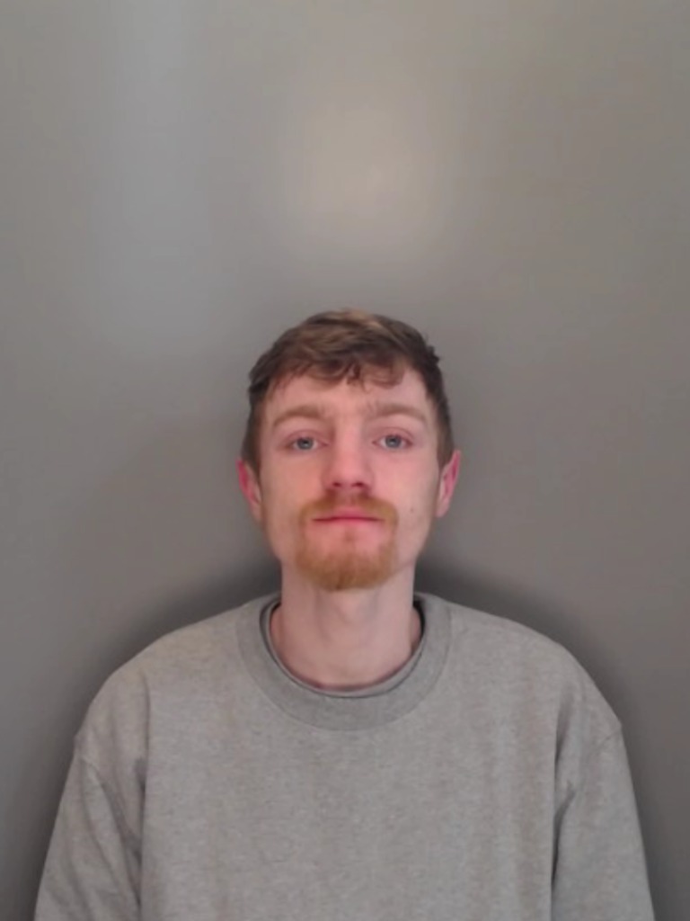 A mugshot of Rhys Smith