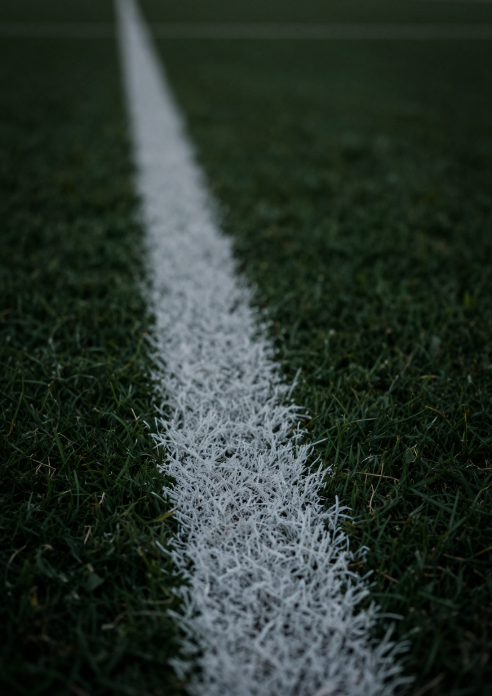 Durham Constabulary's campaign graphic showing the line of a football field with the slogan 'one line can end the game'